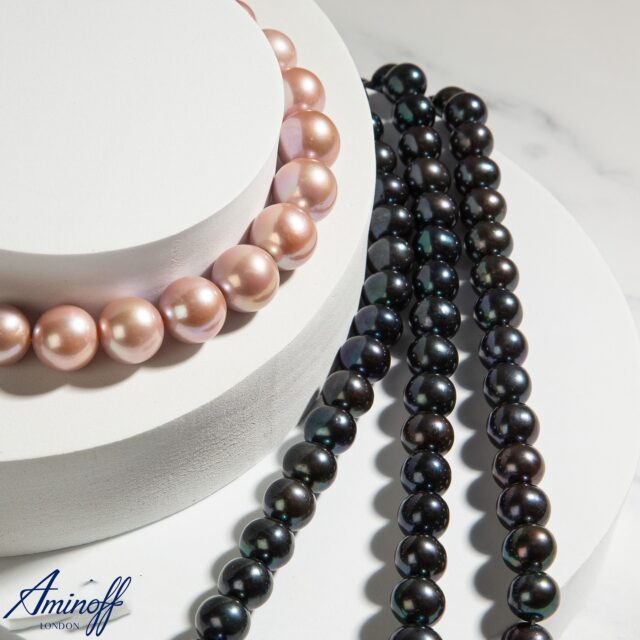 Natural Beauty in Every Hue

From soft blush tones to the deepest iridescent blacks — Aminoff London celebrates the rarest natural pearl colours. Our extensive stock of Freshwater pearl strands is sourced directly from trusted Chinese pearl farms, carefully selected for their lustre, shape, and depth of colour.

Whether you require a single strand or a bulk bespoke order, our experienced team ensures seamless fulfilment with competitive global pricing and personalised service. For over 50 years, Aminoff London has been the name behind the trade’s most exquisite pearls.
 
#AminoffLondon #BlackPearls #PinkPearls #WholesaleJewellery #PearlTrade #PearlSupplier #LuxuryMaterials #Since1972