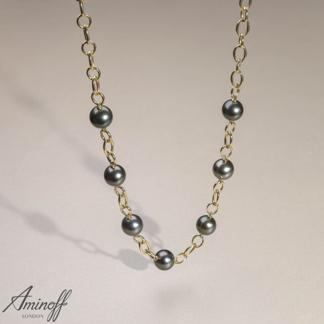 A confident, design-led piece in 18ct yellow gold, this substantial chain necklace is punctuated with 12mm near-perfect round Tahitian pearls.
 
Chosen for their rich natural overtones and high-quality surfaces, the pearls are seamlessly integrated into bold gold links, creating a striking yet wearable silhouette.
 
Part of our Genderless Range, this piece offers timeless appeal across styles and audiences.

#FineJewellery #TahitianPearls #GoldJewellery #GenderlessJewellery #ModernJewellery #LuxuryJewellery #StatementJewellery #PearlJewellery #HighJewellery #JewelleryBuyers #ContemporaryJewellery #UnisexJewellery #RetailJewellery #LuxuryStyle