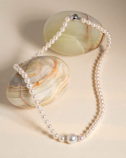 Classic pearl jewellery reimagined with contemporary refinement. This 18ct white gold single-row necklace features AAA Akoya pearls centred with a South Sea pearl and diamond rondels, bringing together exceptional lustre, precision matching, and fine diamond detailing in one elegant design. The clean symmetry and soft graduation create a sophisticated piece suitable for both day and evening wear.
 
Created exclusively by Aminoff London, this necklace represents our longstanding expertise in fine pearl jewellery since 1972. Each pearl is individually selected to ensure consistency of lustre, surface quality, and colour balance, resulting in a piece of lasting elegance and rarity. This design is available exclusively through Aminoff London.
 
Clients are welcome to arrange private viewings 5 days a week between 08:00 – 18:00 at our London showroom. Appointments can be booked by email or telephone, offering the opportunity to explore our collections, compare pearl grades, and discuss bespoke jewellery commissions in person.
 
#AminoffLondon #PearlNecklace #SouthSeaPearls #AkoyaPearls #DiamondJewellery #LuxuryJewellery #FinePearls #PearlCollector #ClassicJewellery #WhiteGoldJewellery #LuxuryStyle #HattonGarden #ExclusiveDesign #HighJewellery #PearlSpecialist