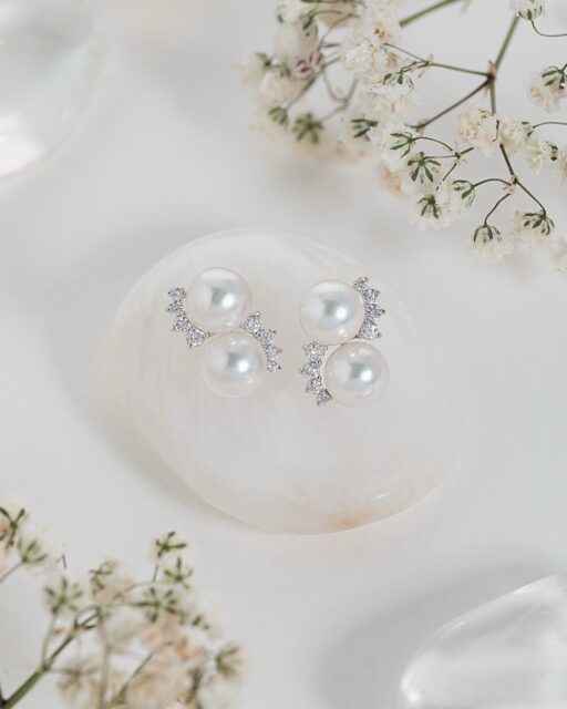 Perfectly round Akoya pearls are framed by delicate half-circles of diamonds, creating a softly sculptural pair of earrings crafted in 18ct gold. The contrast between luminous pearls and precise diamond detailing gives this design a distinctly contemporary elegance.
 
Pearls have been worn for thousands of years, although the identity of their very first wearer has been lost to history. Surviving Greek pearl and gold jewellery dates to around 330–300 BCE, while pearl earrings later became particularly fashionable among women in ancient Rome. Unlike other gemstones, pearls could be admired without cutting or polishing, making their natural beauty exceptional from the very beginning.
 
Designed by Aminoff London.
 
#AminoffLondon #FineJewels #AkoyaPearls #PearlEarrings #DiamondJewellery
