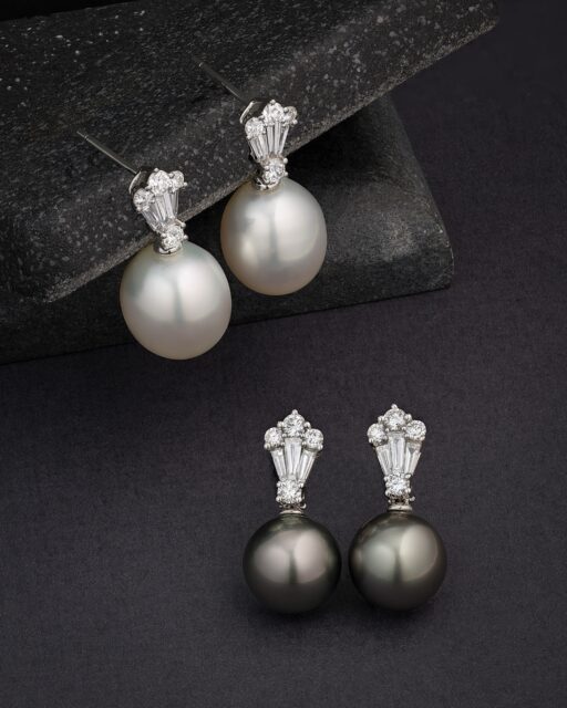 A more architectural interpretation of the pearl drop earring.
 
These 18ct white gold earrings feature 0.71cts of illusion-set diamonds, arranged to create greater presence and brilliance above a pair of substantial 11mm South Sea or Tahitian cultured pearls.
 
Tahitian pearls can take around 18–24 months to cultivate, and their appeal lies in the remarkable intensity and individuality of their natural colouring. Deep silver, graphite, green and peacock overtones can appear especially dramatic under different lighting, with no two pearls ever presenting in exactly the same way.
 
That individuality also makes matching especially challenging. Producing a fine pair requires two pearls with closely aligned colour, overtone, shape, surface quality and lustre — and achieving the same consistency across larger sets is rarer still.
 
#FineJewellery #PearlEarrings #TahitianPearls #DiamondJewellery #LuxuryJewellery